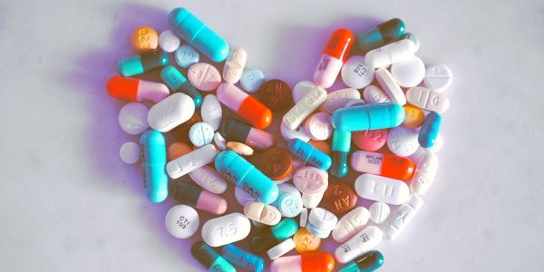 A compiled bunch of pills shaped into a heart, because art.