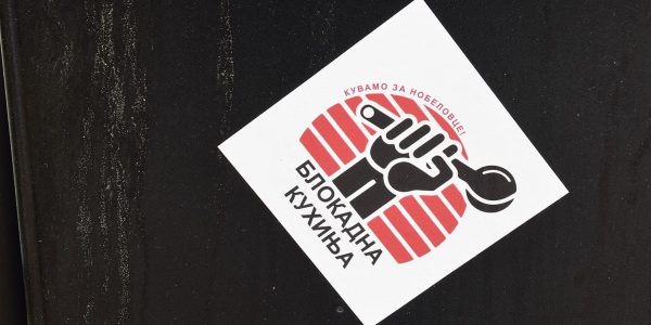 A logo with serbian text for a kitchen.
